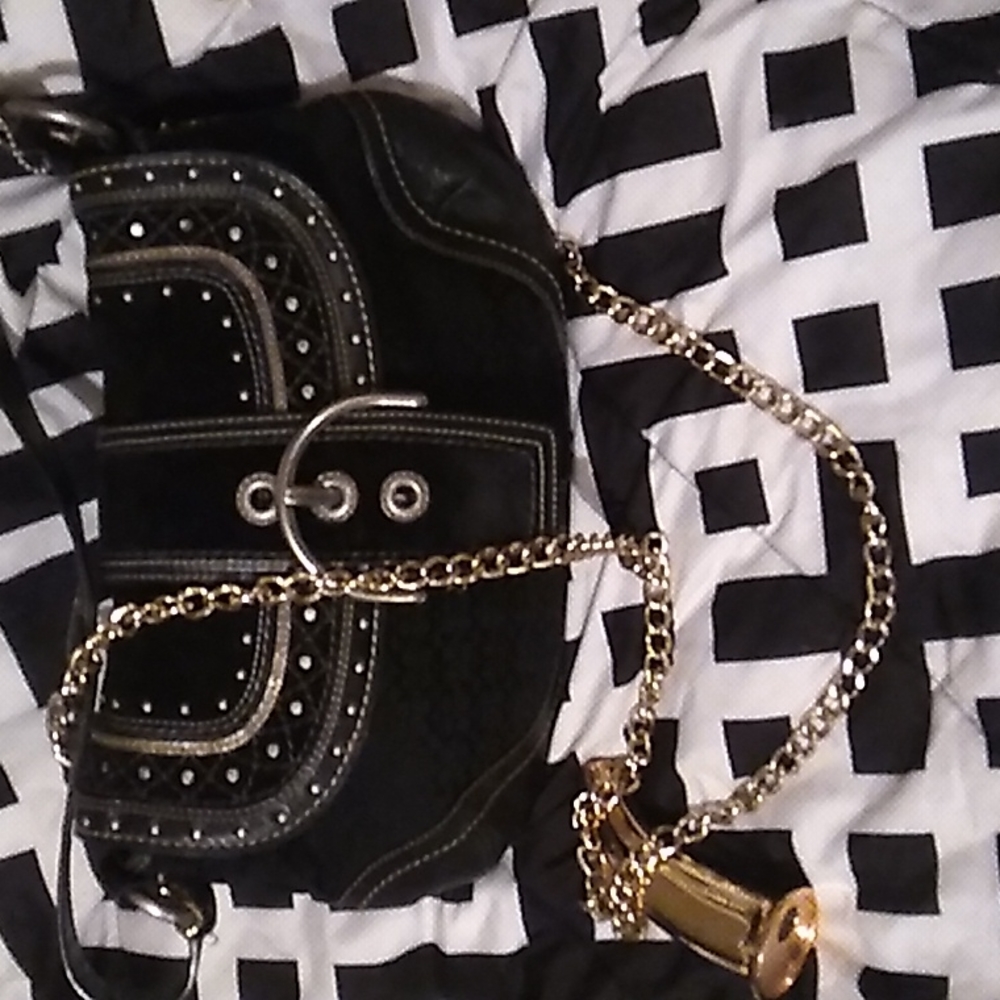 Coach black jacquard shoulder/crossbody bag.